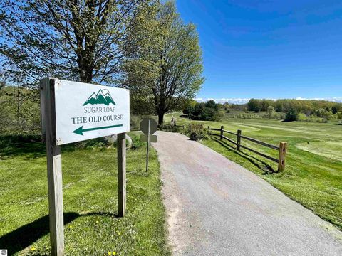 Tiny photo for 18 S Club Drive #18, Cedar, MI 49621 (MLS # 1940081)