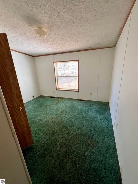 Tiny photo for 9374 Pine Circle Drive NW, Rapid City, MI 49676 (MLS # 1940625)