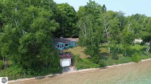 Photo of 1070 N US-31, Kewadin, MI 49648 (MLS # 1937022)