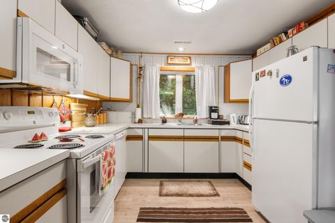 Tiny photo for 1070 N US-31, Kewadin, MI 49648 (MLS # 1937022)