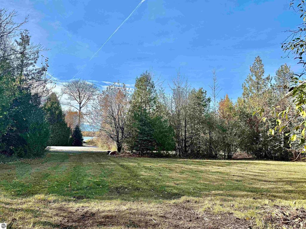 Photo of 305 Rivershore Drive, Elk Rapids, MI 49629 (MLS # 1940294)