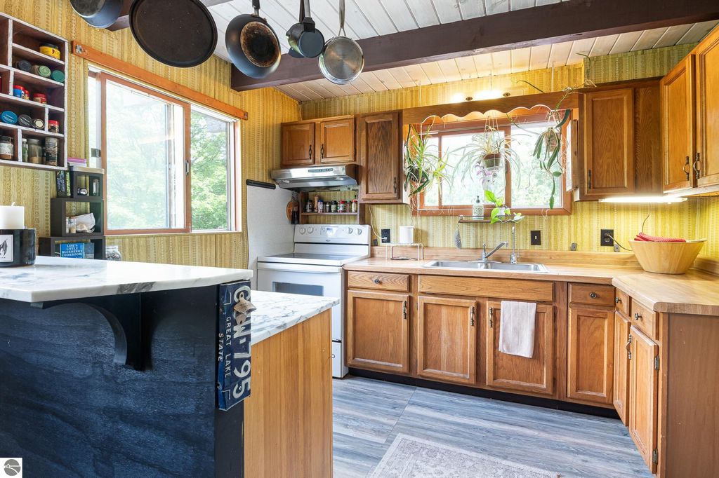 Photo of 6551 M-32, Elmira, MI 49730 (MLS # 1937241)