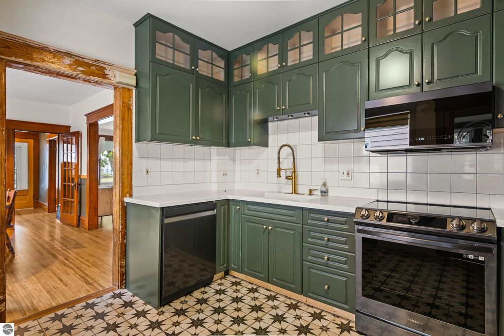 Photo of 1024 W Front Street, Traverse City, MI 49684 (MLS # 1939736)