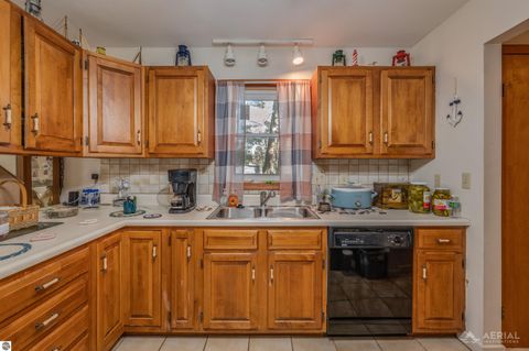 Tiny photo for 965 Grove Street, Tawas City, MI 48763 (MLS # 1941335)