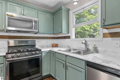 Tiny photo for 994 US-31 N, Kewadin, MI 49648 (MLS # 1941178)