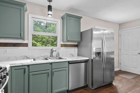 Tiny photo for 994 US-31 N, Kewadin, MI 49648 (MLS # 1941178)