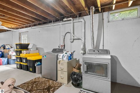 Tiny photo for 994 US-31 N, Kewadin, MI 49648 (MLS # 1941178)