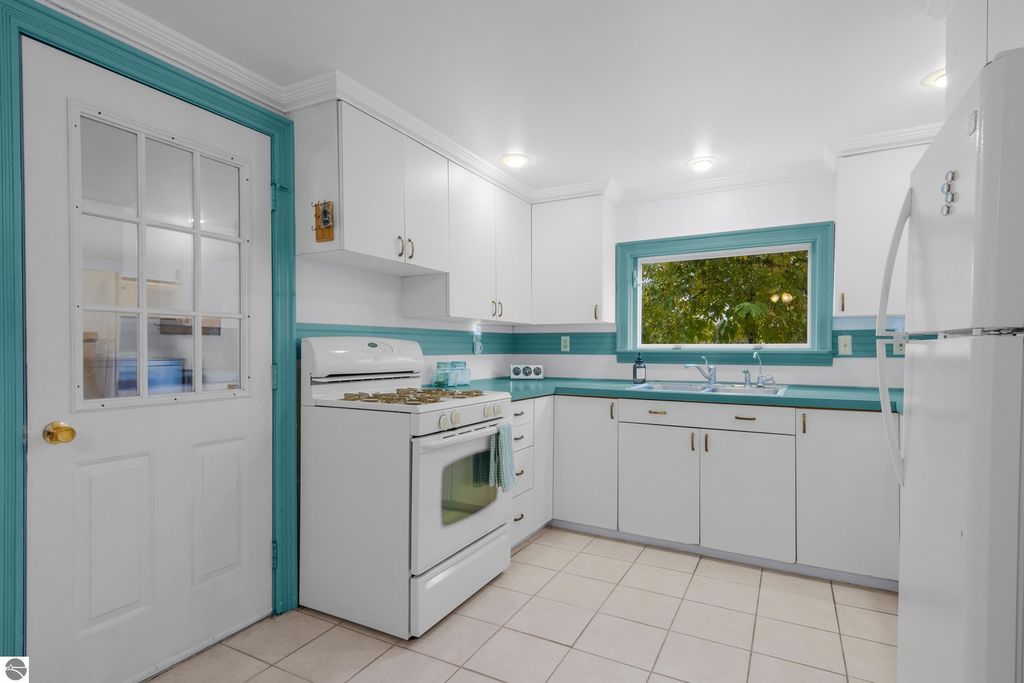 Photo of 6103 Holt Road, Williamsburg, MI 49690 (MLS # 1939881)