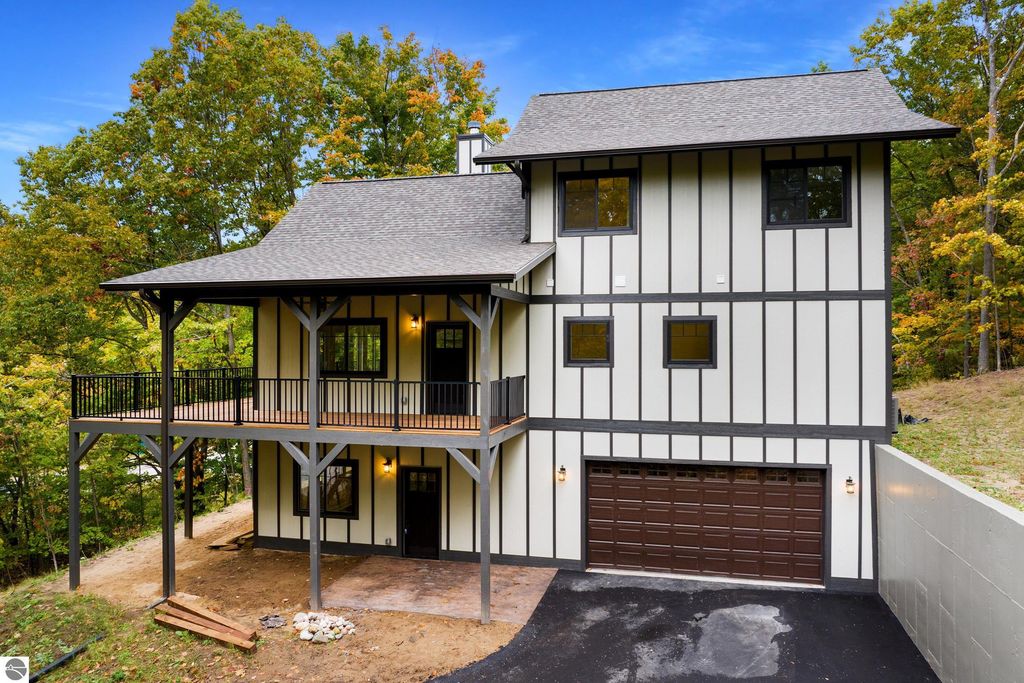 Photo of 4099 S Sugar Loaf Mountain Road, Cedar, MI 49621 (MLS # 1939744)