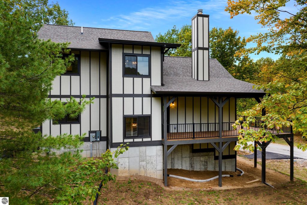 Photo of 4099 S Sugar Loaf Mountain Road, Cedar, MI 49621 (MLS # 1939744)