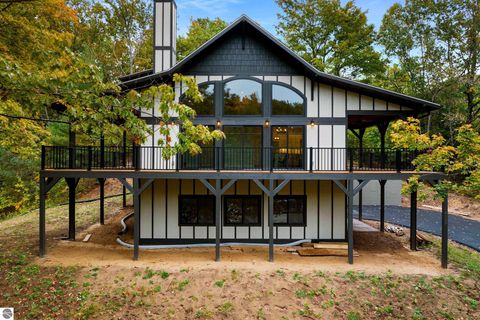 Photo of 4099 S Sugar Loaf Mountain Road, Cedar, MI 49621 (MLS # 1939744)