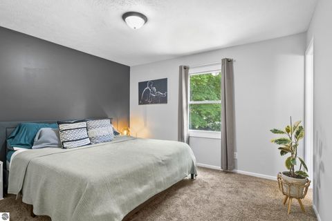 Tiny photo for 994 US-31 N, Kewadin, MI 49648 (MLS # 1935378)