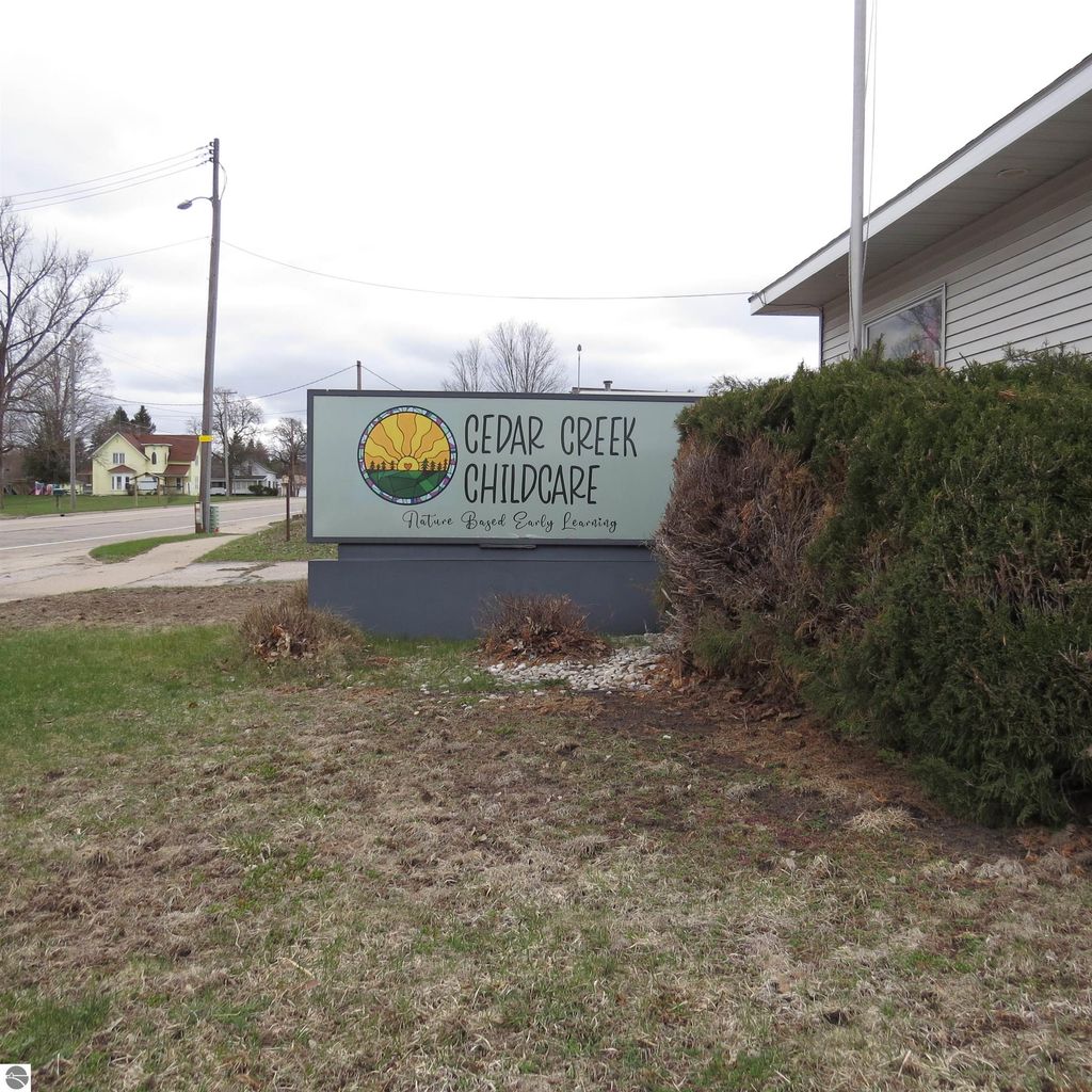 Photo of 516 N Michigan Avenue, Manton, MI 49663 (MLS # 1932517)