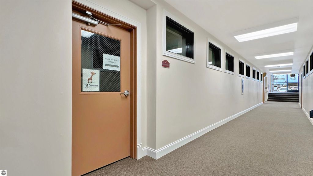 Photo of 117 N Mitchell Street #117-4, Cadillac, MI 49601 (MLS # 1929547)