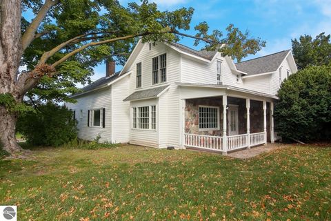 Photo of 8491 US-31 N, Williamsburg, MI 49690 (MLS # 1941112)