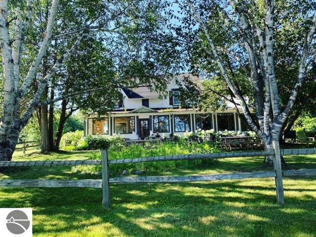 Photo of 149 E Harbor Highway, Maple City, MI 49664 (MLS # 1939923)