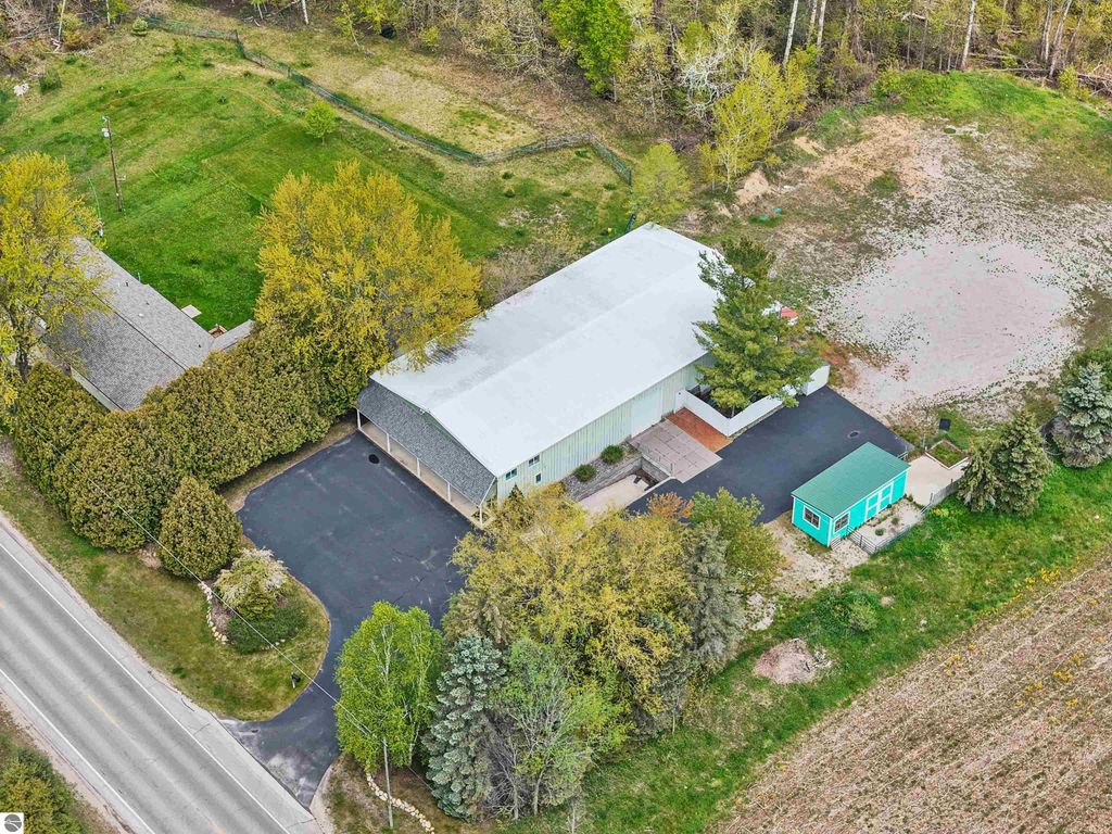 Photo of 9435 E Cherry Bend Road, Traverse City, MI 49684 (MLS # 1936259)