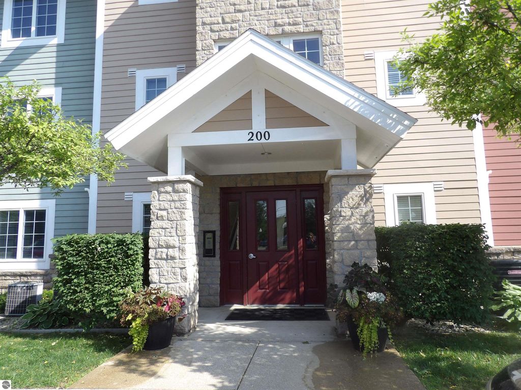 Photo of 1246 Sunnyside Drive #203, 4 &amp; 8, Cadillac, MI 49601 (MLS # 1935317)