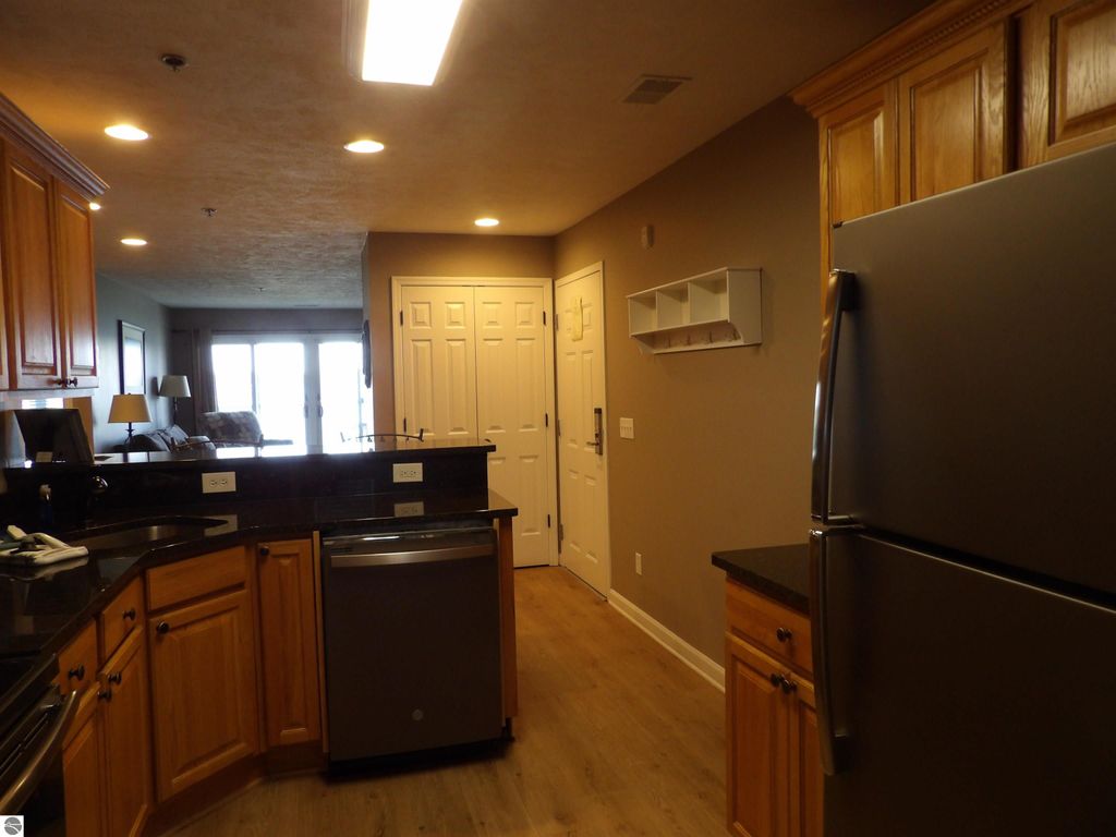 Photo of 1246 Sunnyside Drive #203, 4 &amp; 8, Cadillac, MI 49601 (MLS # 1935317)