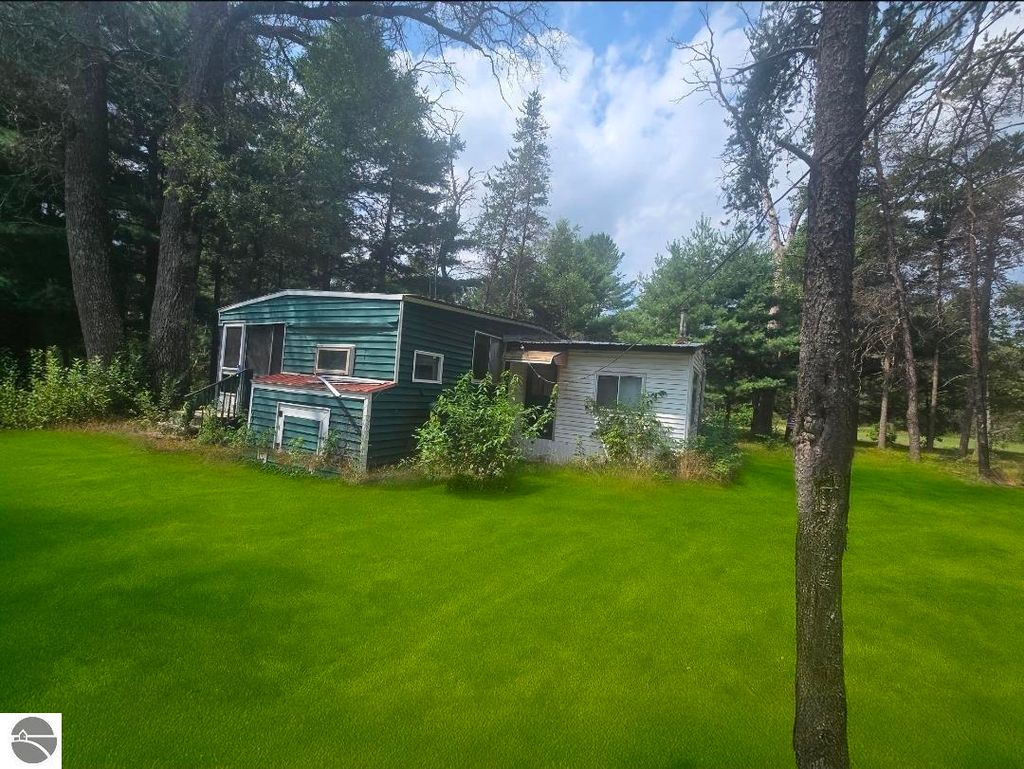 Photo of 795 E Arnold Lake Road, Harrison, MI 48625 (MLS # 1937472)