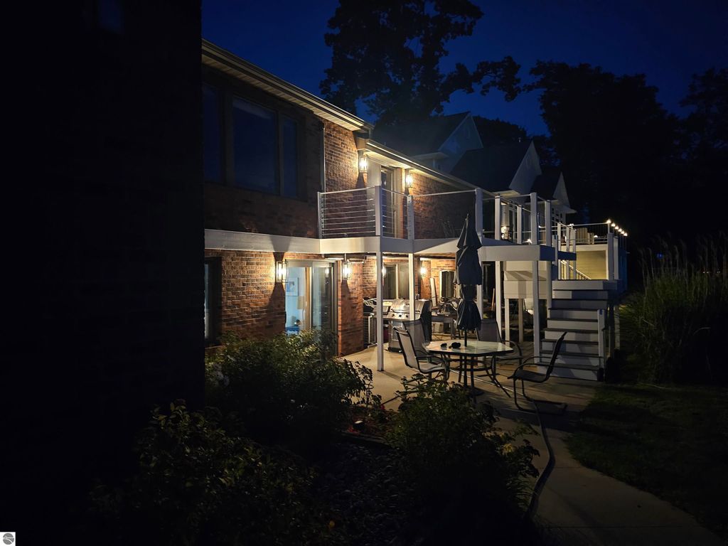 Photo of 815 E Lake Mitchell Drive, Cadillac, MI 49601 (MLS # 1937093)