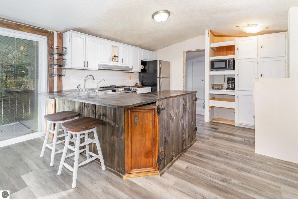 Photo of 5689 E Baseline Road, Mt Pleasant, MI 48858 (MLS # 1940441)