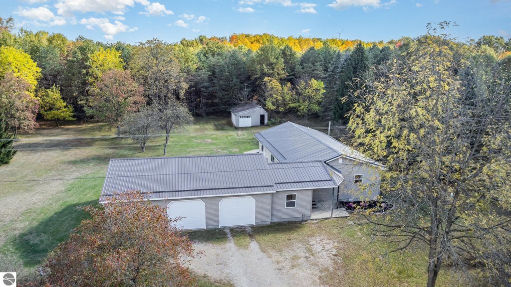 Photo of 4240 N Woodruff Road, Weidman, MI 48893 (MLS # 1939665)