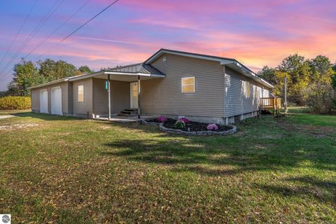 Photo of 4240 N Woodruff Road, Weidman, MI 48893 (MLS # 1939665)