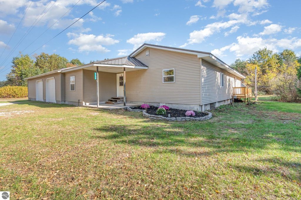 Photo of 4240 N Woodruff Road, Weidman, MI 48893 (MLS # 1939665)