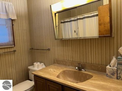 Tiny photo for 220 Smith Street, East Tawas, MI 48730 (MLS # 1941028)