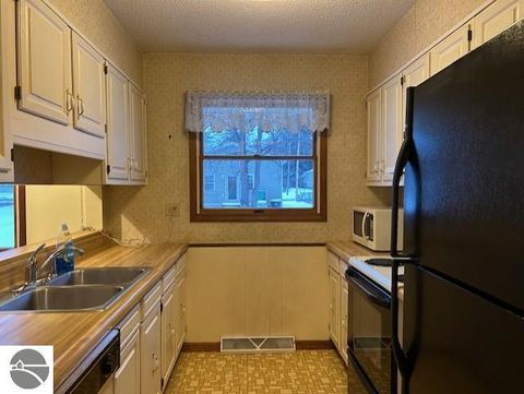 Tiny photo for 220 Smith Street, East Tawas, MI 48730 (MLS # 1941028)