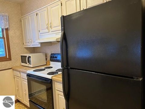 Tiny photo for 220 Smith Street, East Tawas, MI 48730 (MLS # 1941028)