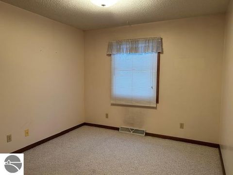 Tiny photo for 220 Smith Street, East Tawas, MI 48730 (MLS # 1941028)