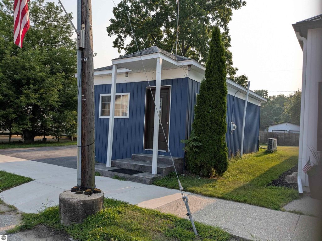 Photo of 3259 N Woodruff Road, Weidman, MI 48893 (MLS # 1937139)