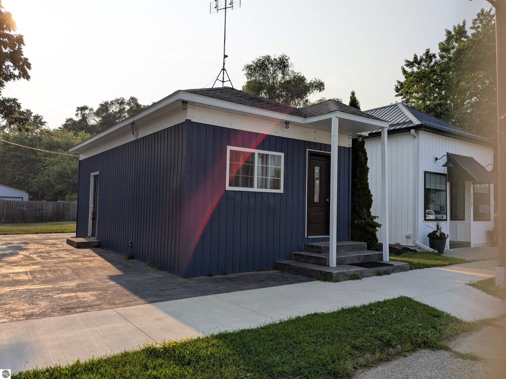 Photo of 3259 N Woodruff Road, Weidman, MI 48893 (MLS # 1937139)