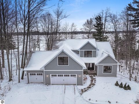 Photo of 8681 Partridge Trail, Elk Rapids, MI 49629 (MLS # 1941095)