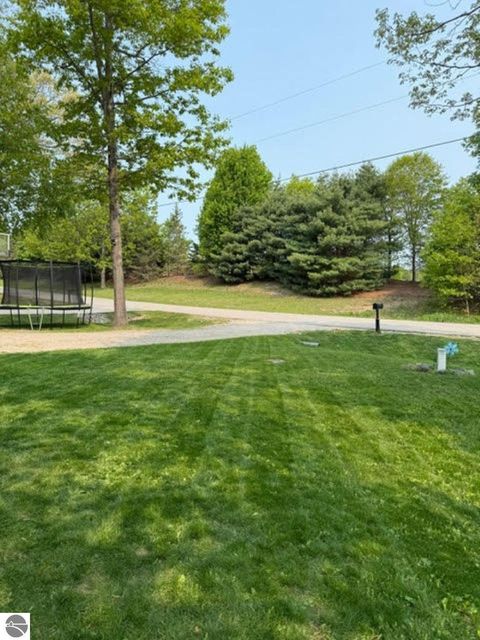 Tiny photo for 9383 First Street, Interlochen, MI 49643 (MLS # 1940728)