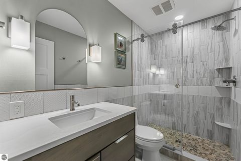 Tiny photo for 5648 MacKenzie Drive, Kewadin, MI 49648 (MLS # 1941039)