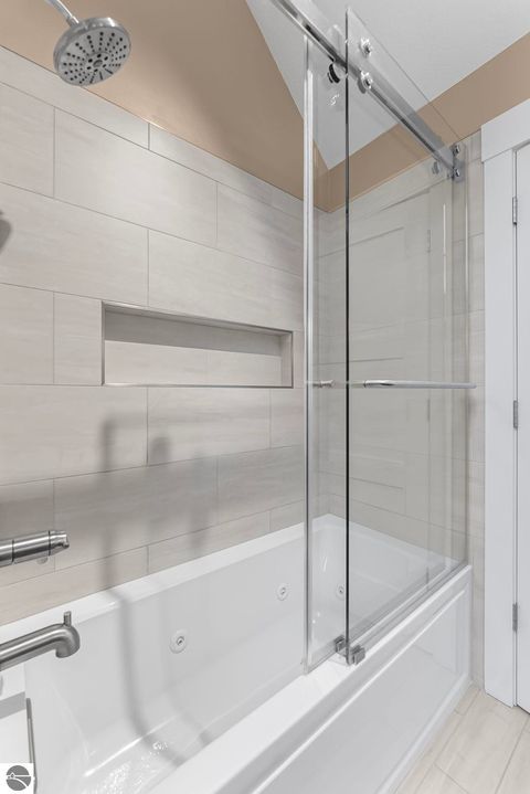 Tiny photo for 5648 MacKenzie Drive, Kewadin, MI 49648 (MLS # 1941039)