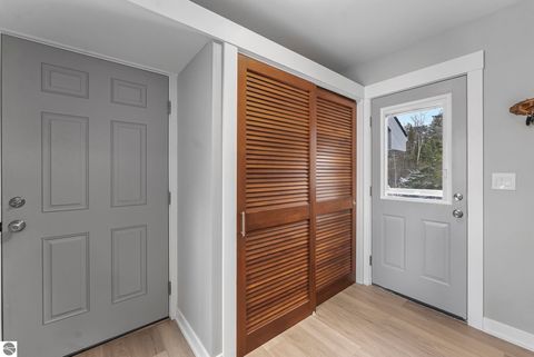 Tiny photo for 5648 MacKenzie Drive, Kewadin, MI 49648 (MLS # 1941039)