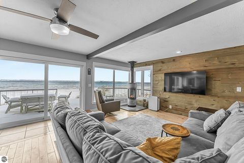 Tiny photo for 5648 MacKenzie Drive, Kewadin, MI 49648 (MLS # 1941039)