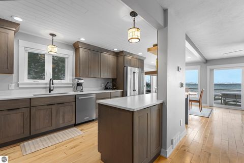 Tiny photo for 5648 MacKenzie Drive, Kewadin, MI 49648 (MLS # 1941039)