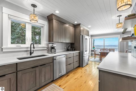 Tiny photo for 5648 MacKenzie Drive, Kewadin, MI 49648 (MLS # 1941039)