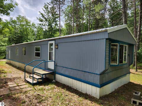 Photo of 5446 Blue Lake Road, Ne RD, Kalkaska, MI 49646 (MLS # 1946809)