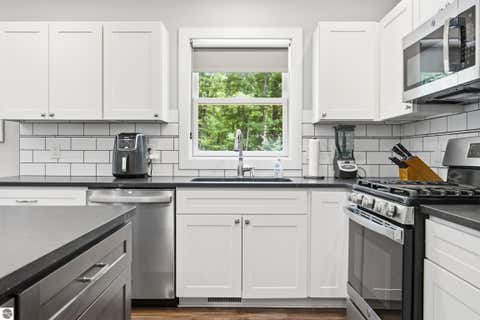 Tiny photo for 4893 S Betsie River Road, Interlochen, MI 49643 (MLS # 1948915)