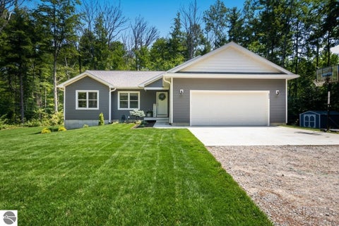 Photo of 4893 S Betsie River Road, Interlochen, MI 49643 (MLS # 1948915)
