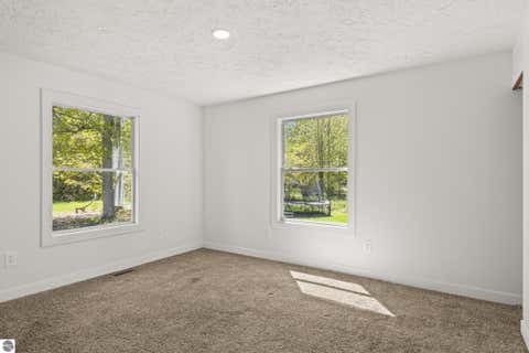 Tiny photo for 90 S Haze Road, Beulah, MI 49617 (MLS # 1946043)