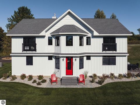 Photo of 6551 Huntsman Drive, Williamsburg, MI 49690 (MLS # 1942750)