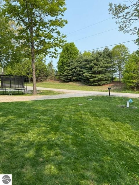Tiny photo for 9383 First Street, Interlochen, MI 49643 (MLS # 1942782)
