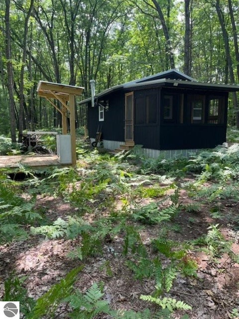 Tiny photo for 942 N 47 1/2 Road, Manton, MI 49663 (MLS # 1941808)